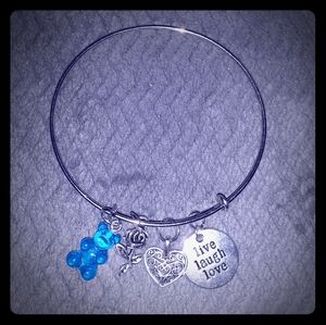 Adjustable silver tone bangle bracelet